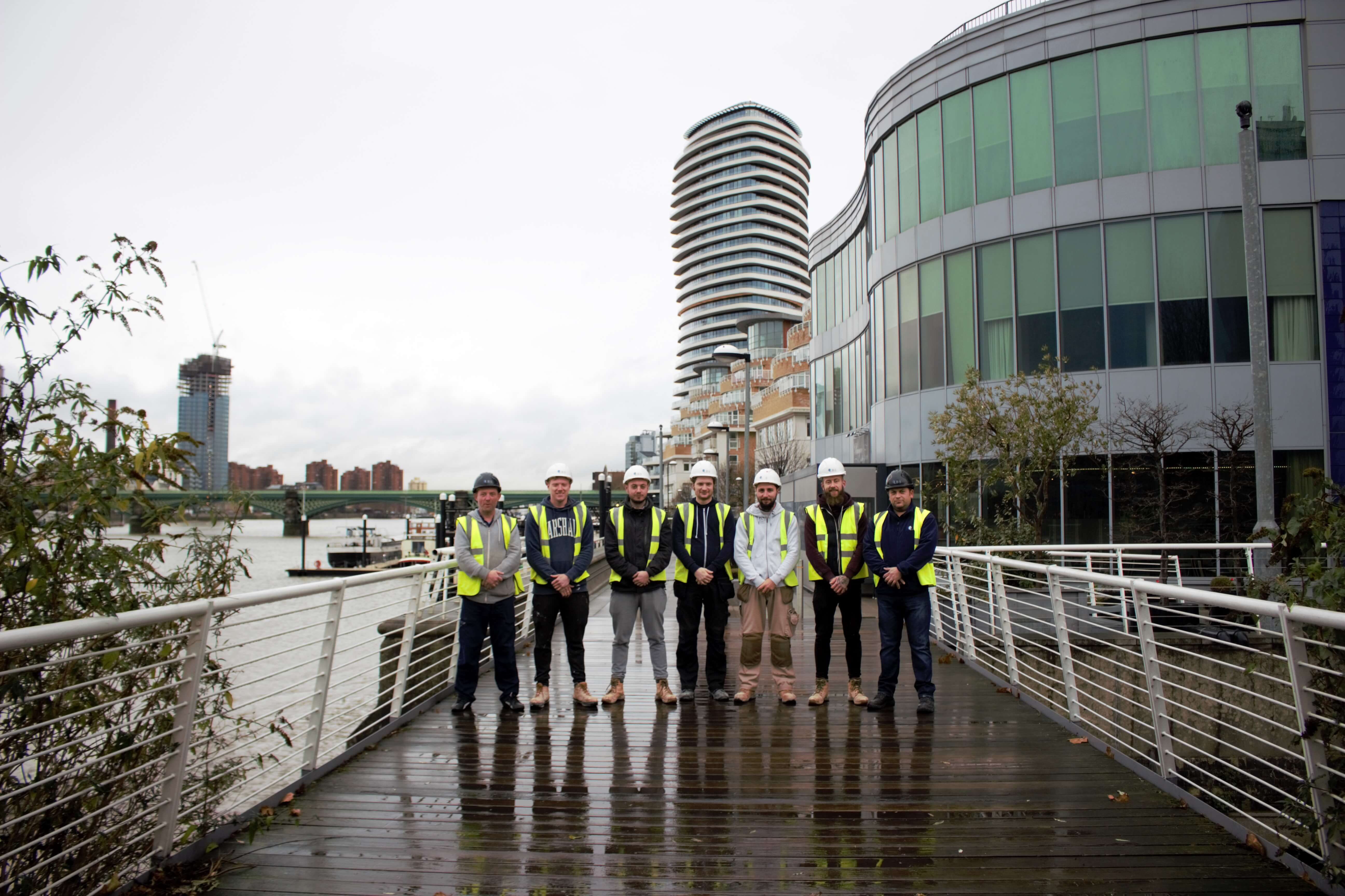 Members of Logistical Building Services (Electrical)'s Mechanical and Electrical teams outside of Lombard Wharf, Battersea, London.